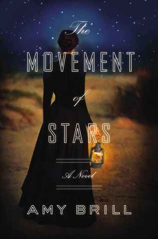 The Movement of Stars book cover. A woman dressed in mid nineteenth century black dress, walks along the seashore at night while holding a lantern.